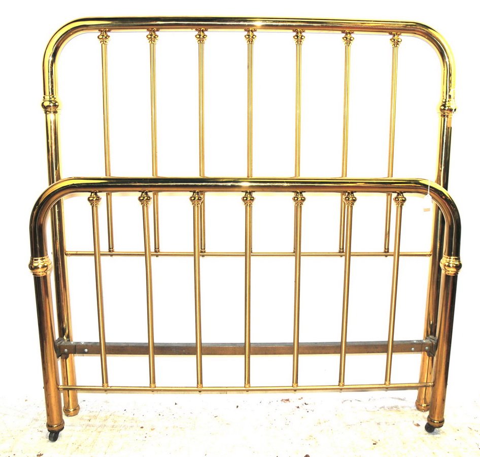 Old full size brass bed with rails: professionally polished, beautiful bed, headboard is 60" H x 54" W. Footboard is 58" H x 54" W.