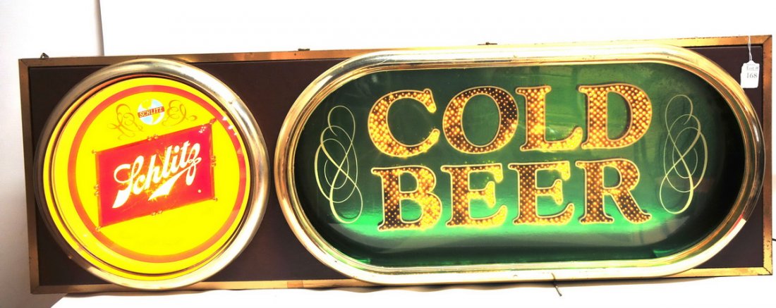 Schlitz lighted beer sign: 4' L x 15 1/2" H x 9 1/2" D.