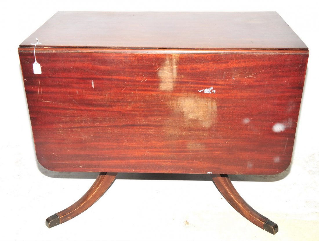 Early Duncan Phyfe walnut drop leaf table: platform base with four rising legs, used condition 40"L X 62"W X 30"H - extended