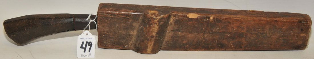 Two Hand made Machetes from circa:1890s: The two machetes in this lot came from the trunk of a Spanish American War soldier. It is not clear where they came from but they retain the scabbards and are clearly hand made and have horn or bone g