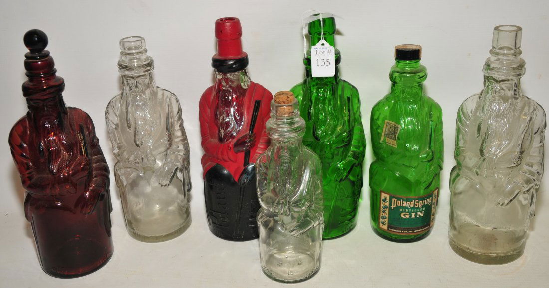 Collection of 7 Poland Spring Moses Bottles: Collection of 7 Poland Spring Moses Bottles