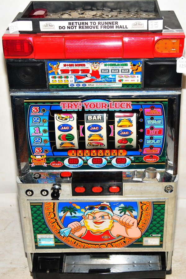 Talyo Co., Ltd slot machine: 32" x 18 1/2" and tokens.
