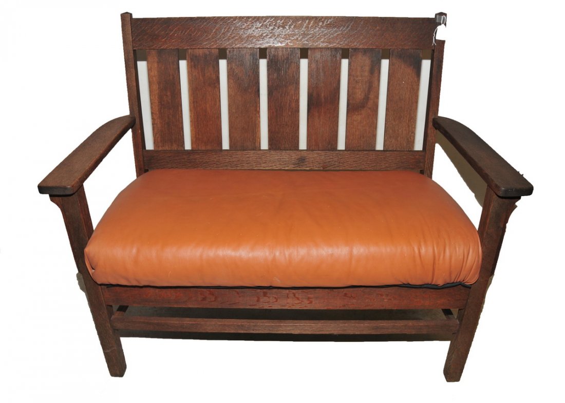 Mission oak settee: with seven slat back. 38" H x 46" W x 21" D.