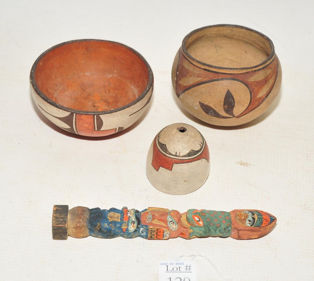 Three pieces of vintage Santo Domingo: Pueblo Indian pottery 4" diameter x 1 1/2" H, 3 1/2" diameter x 3" H, 2" diameter x 2" H. Along with a miniature hand carved, hand painted North West Pacific coast Totem Pole 6 1/2" H.