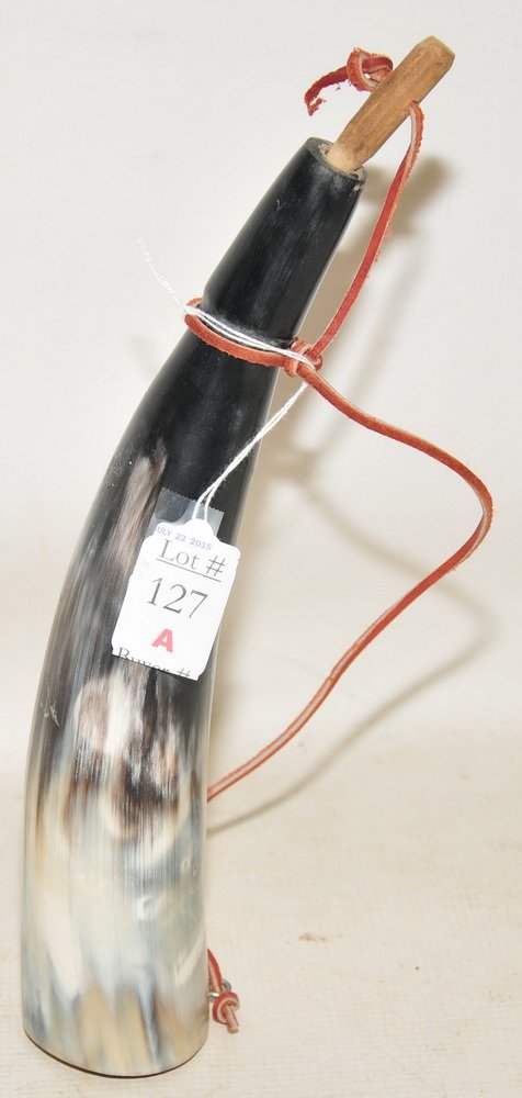 Old black powder horn: with wooden stopper and rawhide sling, 11" L.