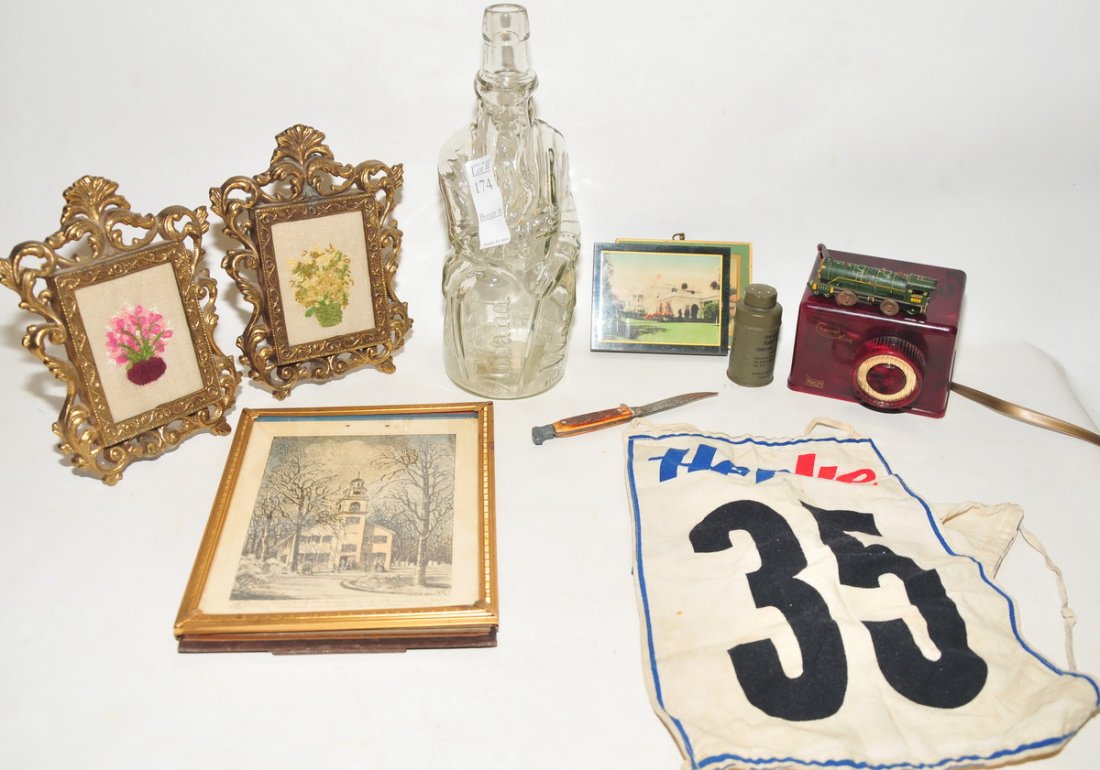 Collection of estate items: Bakelite TV Control, Poland Spring Moses bottle, Victorian frames and more