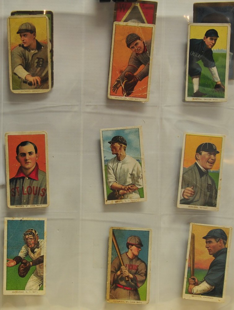 Collection of raw T206/T205 Cards: 9 1909-11 T206 with Polar Bear backs, Schmidt, Phelps, Purtell, Rhodes, Merkle, Jennings, Snodgrass, Hulswitt and Griffith, T205 cards are Donohue, Street and Merkle