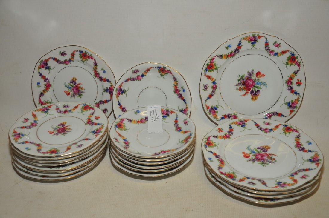 Epiag Czechoslovakia china with flower pattern: consisting of: 5 dessert plates, 9 small plates, 4 teacups, 6 salad plates, 2 serving platters, 7 dinner plates, 10 fruit bowls, 2 soup bowls,1 tureen and 7 saucers. Good condition.