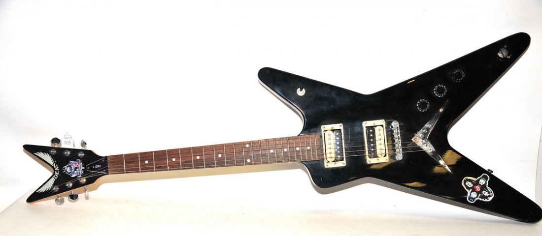 Dean Dimebag Darrell tribute electric guitar: The neck of the guitar is 18" L and the body is 10" W.
