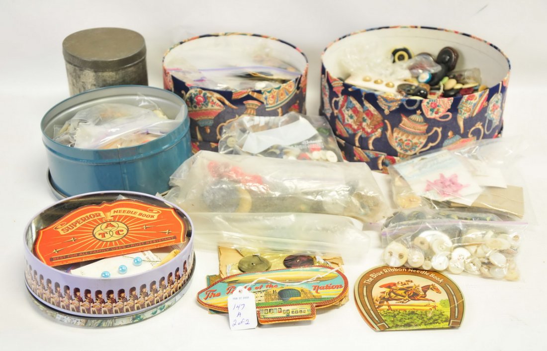Collection of misc vintage and: colorful antique buttons and needle folders.