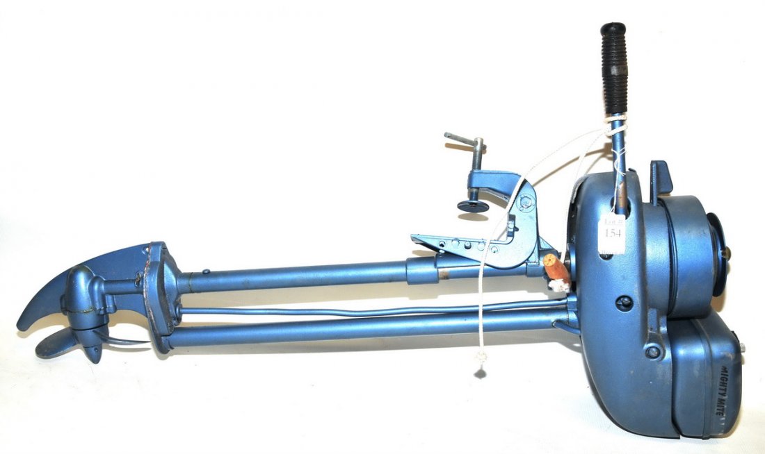 1960's Mighty Mite boat motor: old new condition, never been used or had gas in it, 33" L.