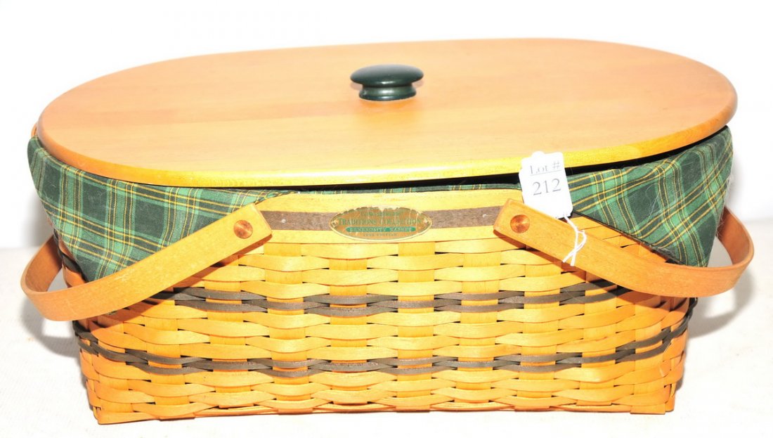 Longaberger Traditions Collection: wooden Generosity basket 1999 edition with divider and green plaid handkerchief liner, has carrying handles and cover. 19 1/2" W x 8" H.