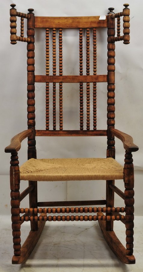 Wing Sausage rocker with turned: spindle back and thrush seat, 41 x 21 x 24.