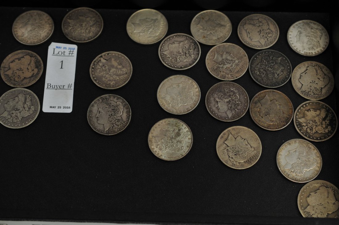 Collection of 22 US Silver Dollars: 17 Morgan Dollars and 5 Peace Dollars, 1892-CC, 1884-O, 1880, 1902, 1894-O, 1889, 1882-O, 1879, 1882-O, 1884, 1880, 1889, 1879, 1890-O, 1889-O, 1879, 1891 Morgan Dollars, 1925, 1923, Rare 1928 Plain P
