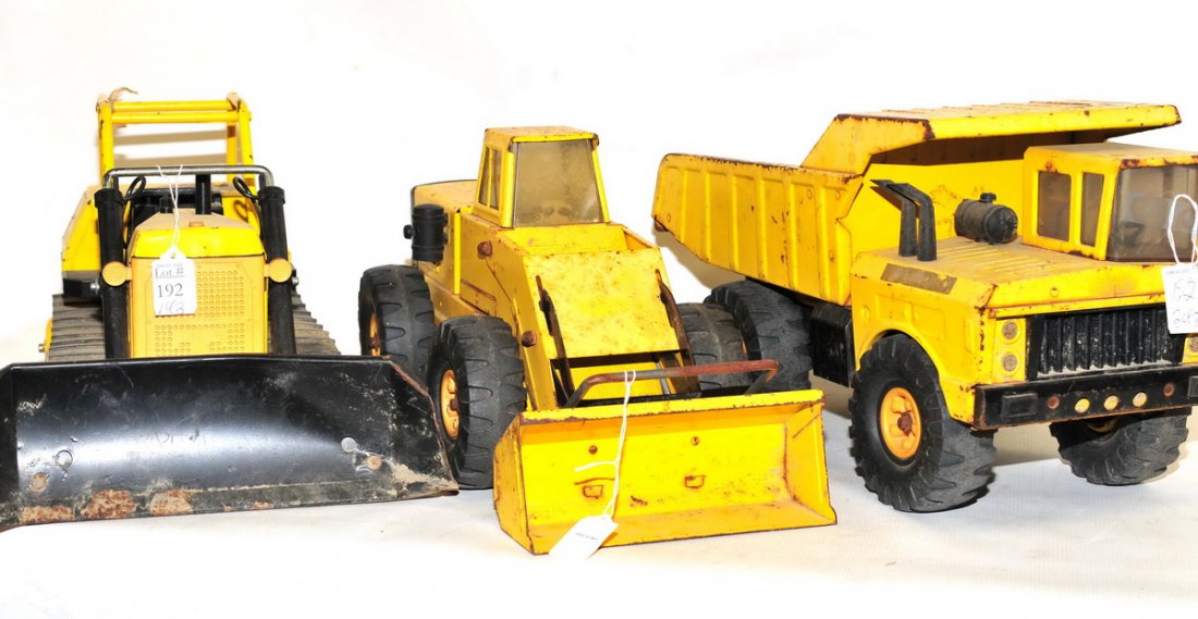 Three Vintage Tonka Toys: Dozer, Loader and dump average size 9" X 18" , good condition