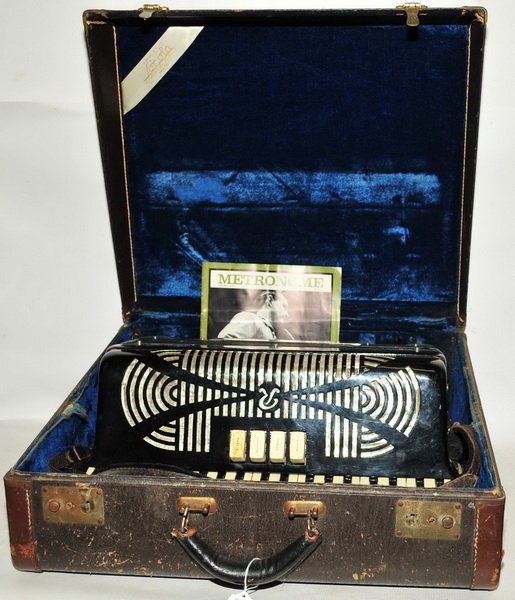 Antique Rivoli Accordion: In Original Case with song book