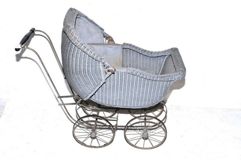 Antique Doll Pram: Wicker Construction, iron wheels, 36" total length