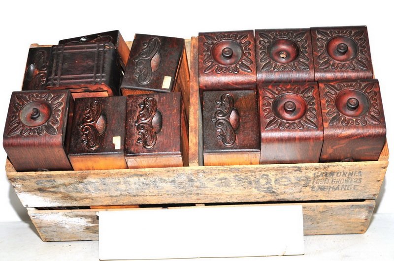 13 Antique Drawers: Small Antique Drawers, likely from a sewing machine case, contained in an antique advertising box