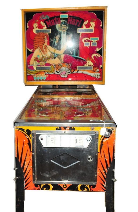 Bally Mata Hari Pinball Game 1978: Machine has incredible graphics, heavily sought after game, measures 52" long and 70" tall, machine lights up when plugs in, however does not function for play. All Controls work, but ball does not ge