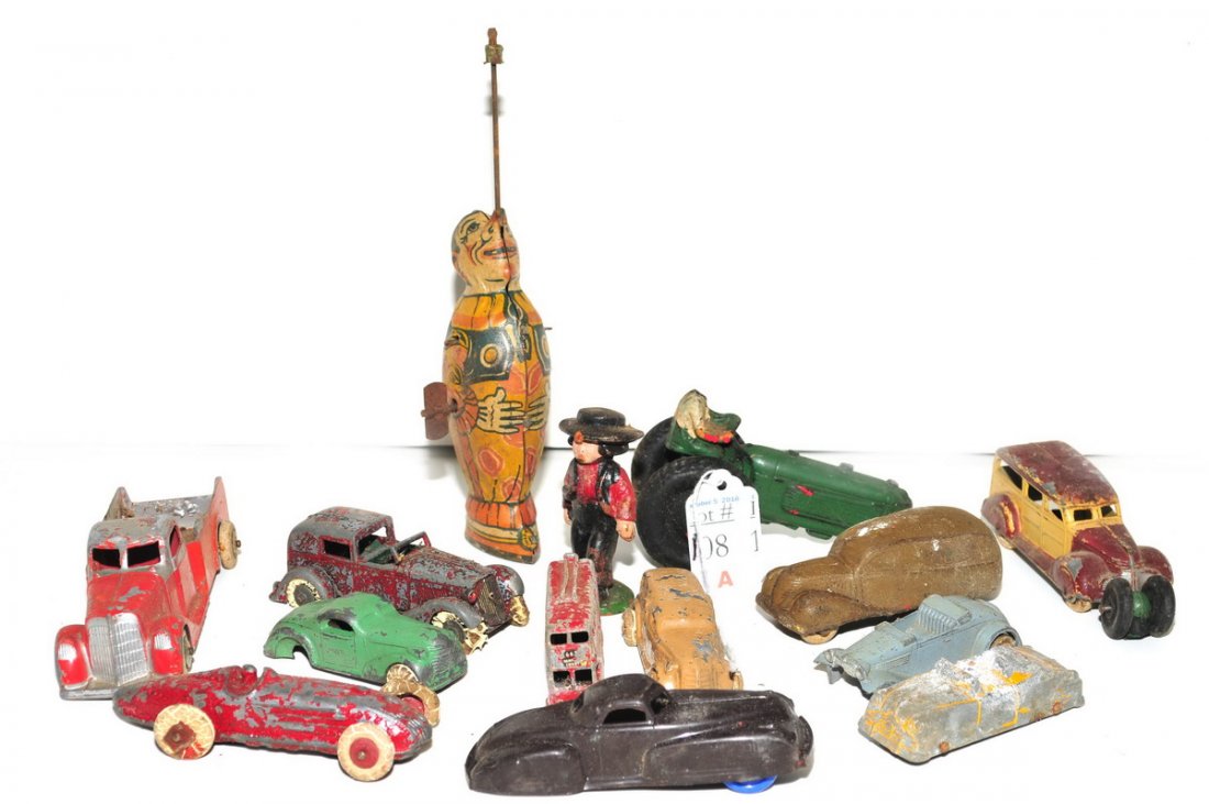 14 Antique Toys/Cars: J. Chein Wind up clown, Rubber cars, Pressed Steel cars and more