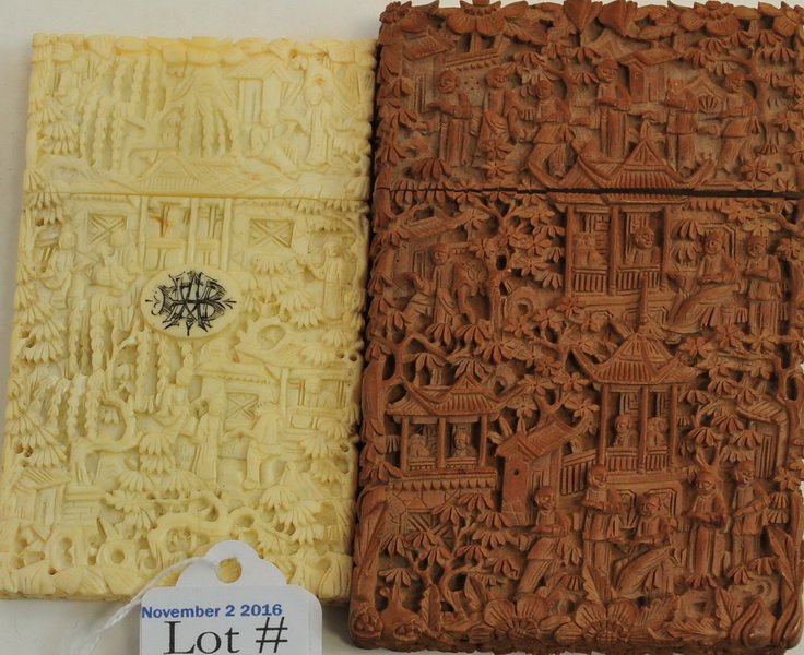 Two antique carved playing card cases: One made of an exotic wood such as Teak, second is likely bone or ivory, circa 19th century , teak one measures 4 1/2", bone or ivory colored on is 4"Good Condition