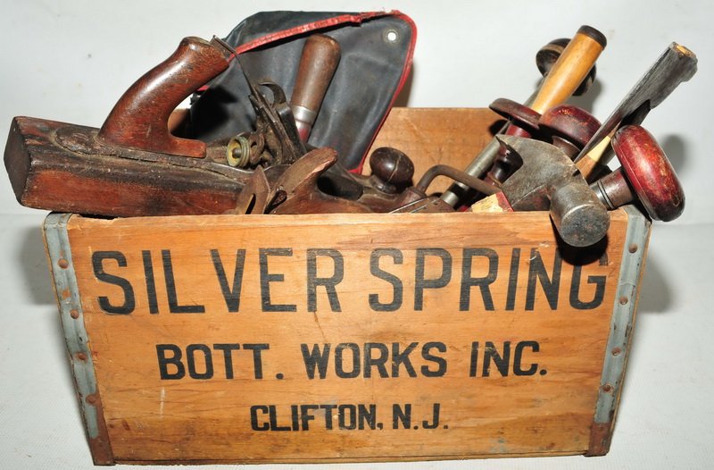 Advertising Box filled with tools: Including Chisels, Drills, Hatchet, Planes ,box is Silver Springs Bottle Works
