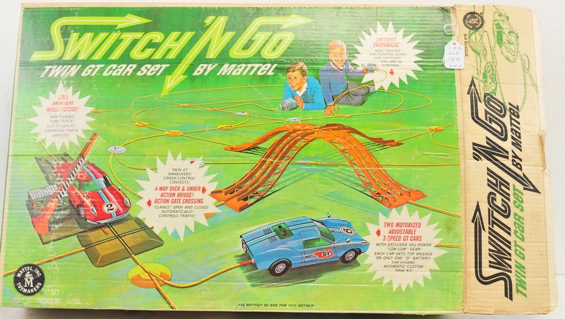 Race Car set with 4 Models: Found as is Switch n Go twin GT car set by Mattel. Models are Ambassador 1969, Surfite with Tiki hut, Dune Buggy Kyote, The Visible V8