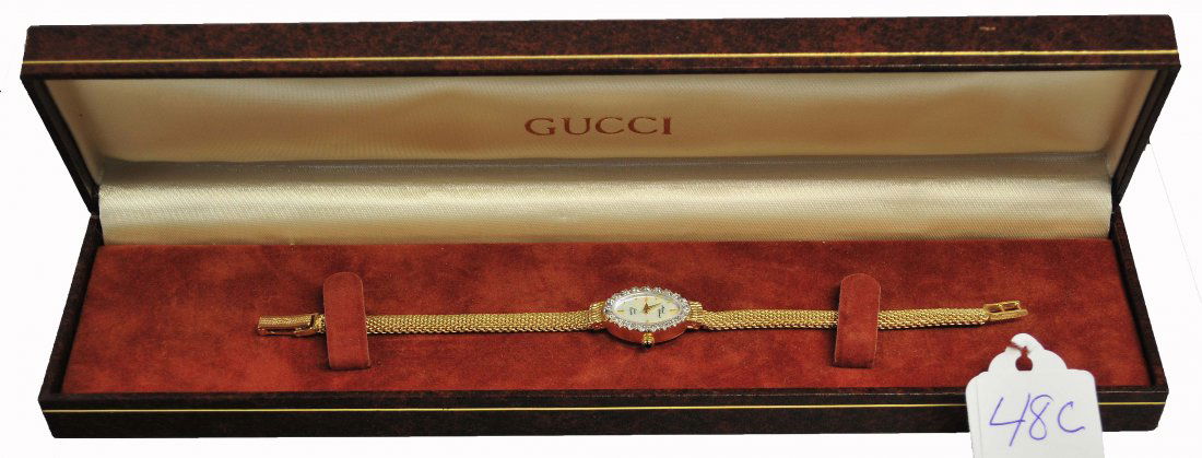 14K Gold & Diam Ladies Michael Anthony Wrist Watch: Running 14K Gold & Diamond Ladies Michael Anthony Swiss quartz watch with new battery. Eta Movement 5 Jewel swiss V8. 16 Grams total. 17.25 MM Wide x 6.5" long Band"****Note this item was won in a pre