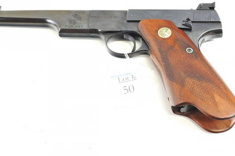 1938 Colt 1st Match Target Woodsman 22 Pistol: 99.9% Condition appears to be unfired comes with a rare Heiser Holster and one spare magazine