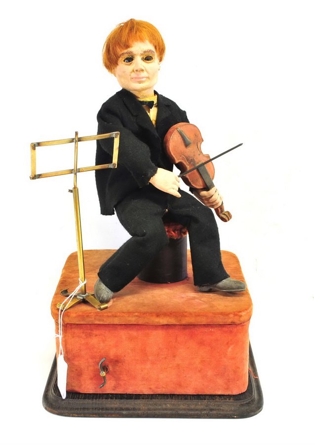 Antique Violin Player Automaton: Works are intact however the motor is too weak to function properly, unknown maker, measures 16" tall