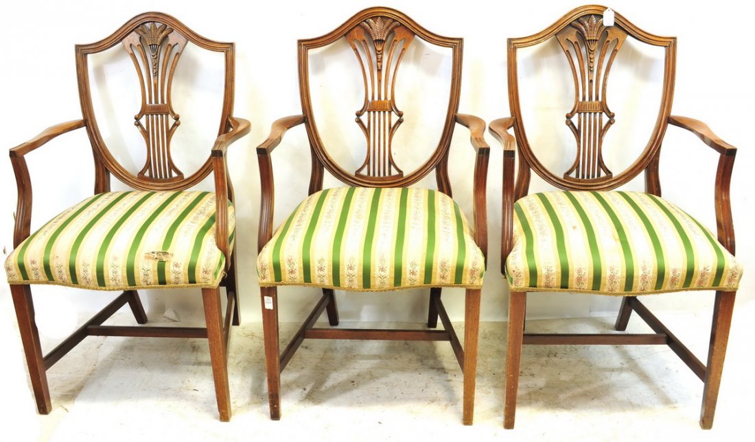 Six Antique Mahogany Shield Back Arm Chairs: Sheraton Style in good shape with green and yellow fabric, measures 39x22x19