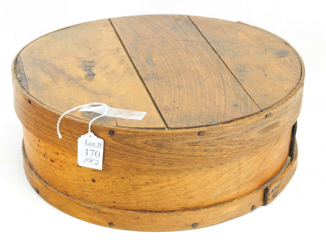 Two Pieces of Americana: Antique Covered pantry box 15" with illegible writing on cover, hand made basket 10"