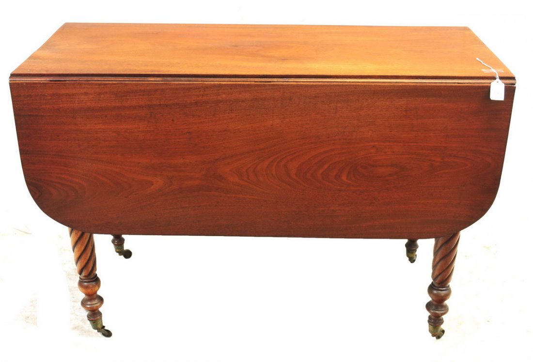 Antique Mahogany Drop Leaf Table: With turned legs, measures 42x18x28