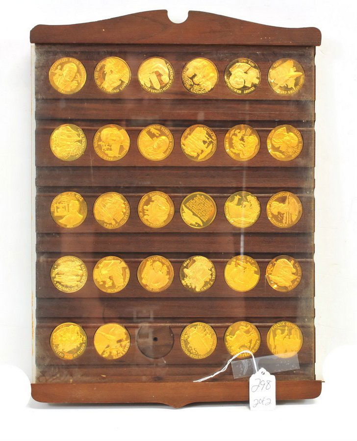 59 Longines 24Kt Over Bronze Medals: Famous Events and People Syphonette Medals, most are proof quality in mahogany display cases , 1 medal missing