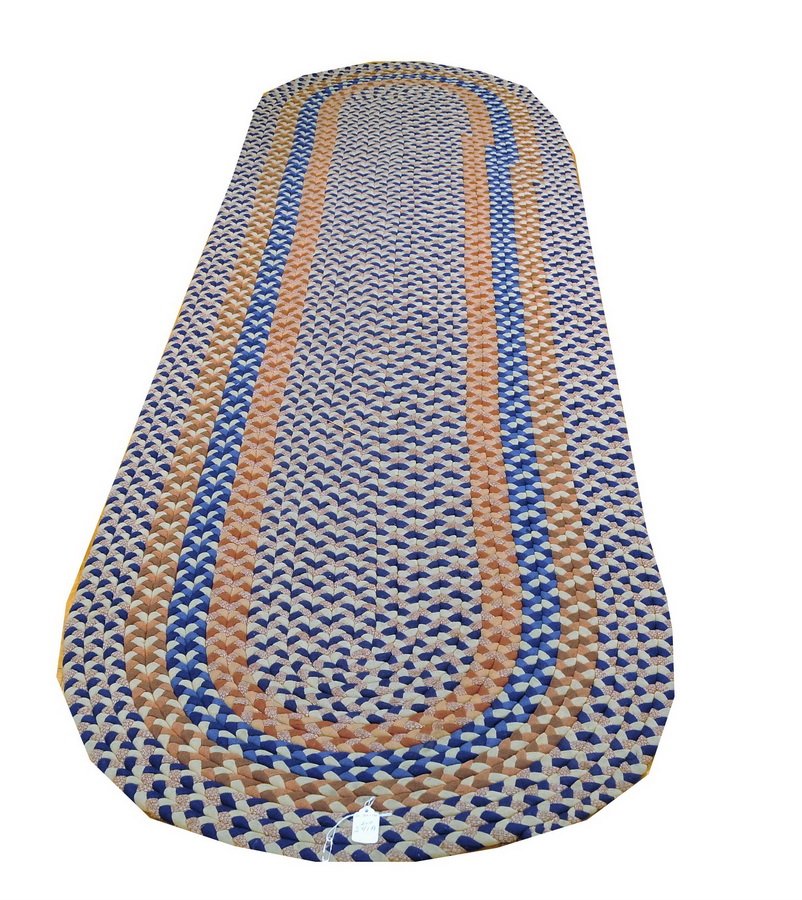 One multi colored braided rug: 10' X 2' 7"