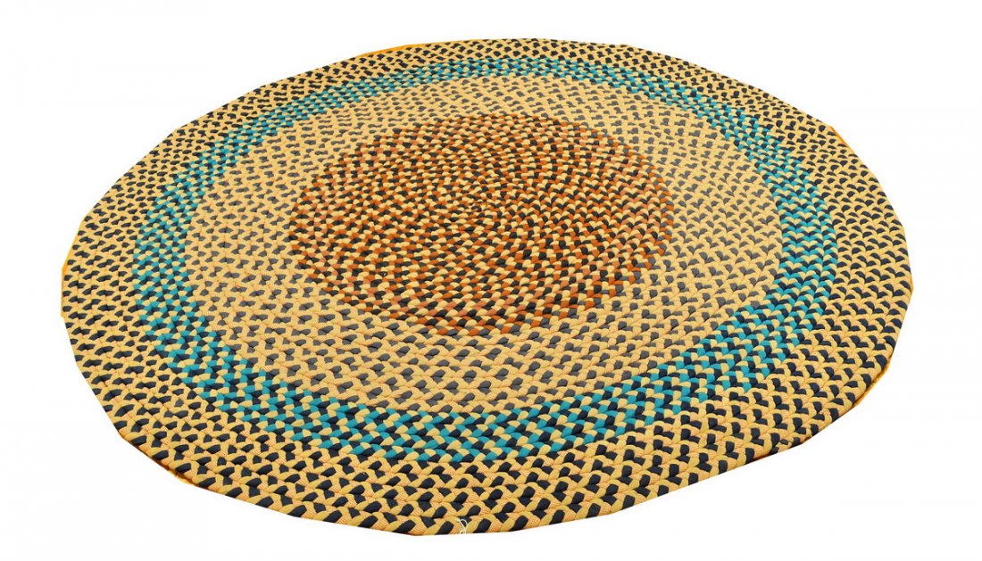 One multi colored braided rug: 67" Diameter