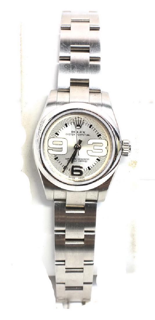 Ladies Rolex Oyster Perpetual Wrist Watch w Box: Ladies Rolex Oyster Perpetual Superlative Chronometer Wrist Watch with Box and Papers. Stainless steel band and case in excellent running condition.