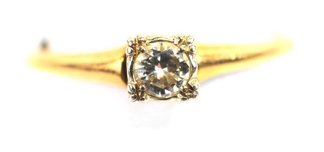 Ladies 1/5 Ct. 14Kt Gold Diamond Solitaire Ring: 1/5 Carat Diamond set in 14Kt. Yellow Gold, 2 Grams, size 8 1/4, has ring sizer attached.