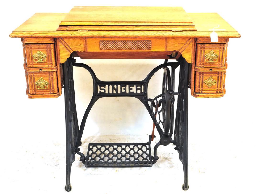 Antique Singer Treadle Sewing Machine: Oak Case, measures 37x31