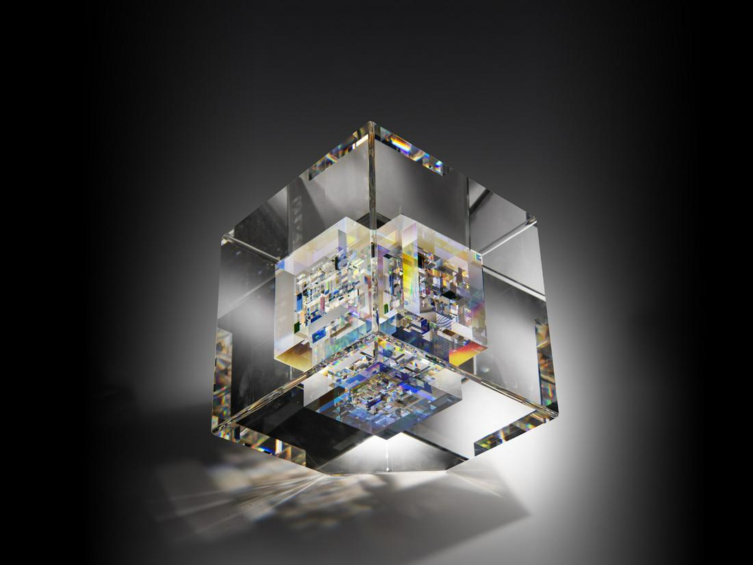 Jon Kuhn Petit Fleur 1992 Art Glass Habatat: Jon Kuhn, (USA), Petit Fleur, 1992, 7.5 x 7.5 x 7.5 inches. A beautiful example of Kuhnâ€™s work. A simple form with vibrant interior activity. Cast and laminated glass; From the collection of Gi