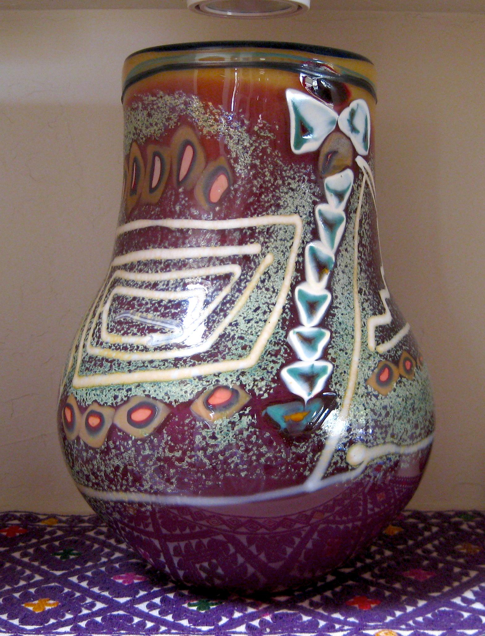 Tony Jojola Blown Glass Pot Art Glass Habatat: Tony Jojola (USA), Blown Glass Pot, 2006. Dimensions. Artist Note: Tony Jojola was born in Albuquerque but raised in New Mexico as an Isleta Pueblo. He is recognized as one of the nation's preeminent 