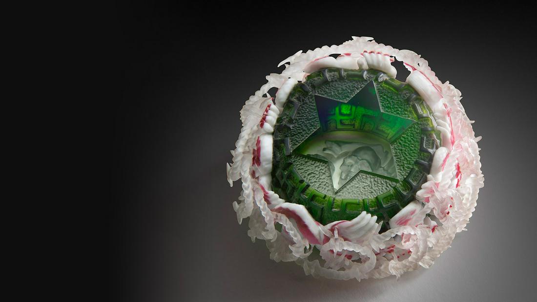 Barry Sautner Holocaust Paperweight Art Glass Habatat: Barry Sautner (USA), Holocaust Paperweight, 1988. 2 x 4 x 4 inches. A haunting theme is beautifully portrayed using the ancient Roman diatreta technique, allowing the artist to bring the past into the