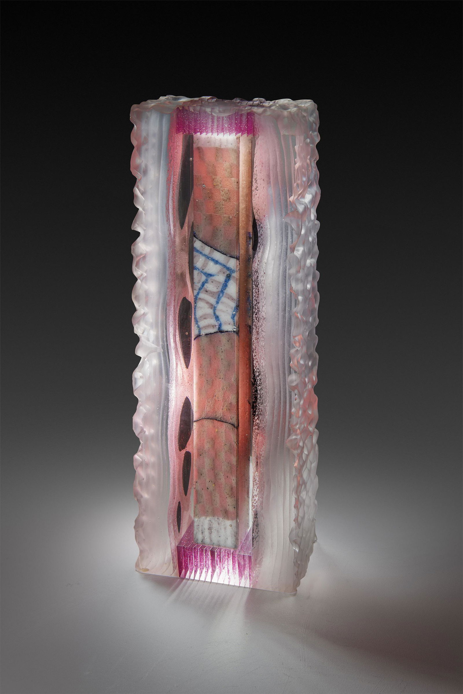 Jon Kuhn Totem Art Glass Habatat: Jon Kuhn (USA), Totem, 1986. 16 x 5 x 3.5 inches. Cast, cut, laminated glass. An impressive transition piece by the artist who is well known in the art world. This work has been pulled from the Habata
