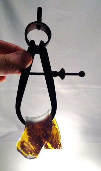 Mary Shaffer "folded glass on steel calipers": Artist: Mary Shaffer Year: early 90s Size: 7.5 x 3 x 1 slumped glass; made for scaled detail at Habatat Galleries for more images please contact Corey@Habatat.com