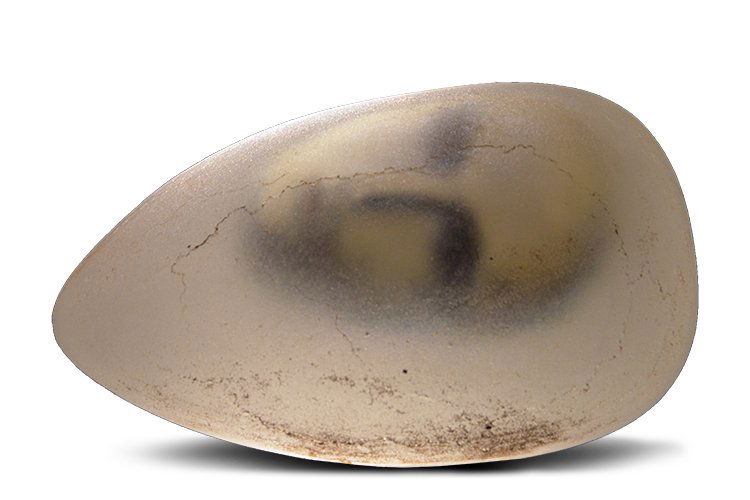 Bertil Vallien, Head, Circa 2000 Glass Art: Bertil Vallien, Head, Circa 2000. 7 x 14 x 11”. A sand cast, ground, polished, and laminated glass sculpture. From a private collection