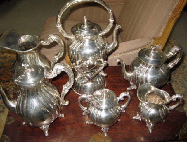 6 Piece Sterling Silver Tea and Coffee Service: Comprised of hot water kettle on stand, water pitcher, teapot, coffee pot, creamer, and covered sugar; made in Mexico, 214 troy oz.
