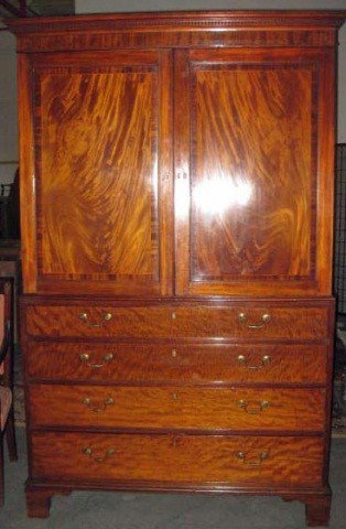 George III Mahogany Linen Press: Upper double doors, with green felt lined interior over 4 block front doors on bracket feet, 79 inches tall, 47 inches wide, 24 inches deep