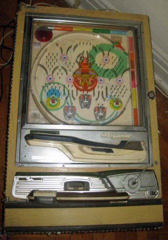 Vintage Pachinko Machine: with threaded pasta "skirt", (crack in glass), 32 inches tall, 20 1/2 inches wide, 9 inches deep