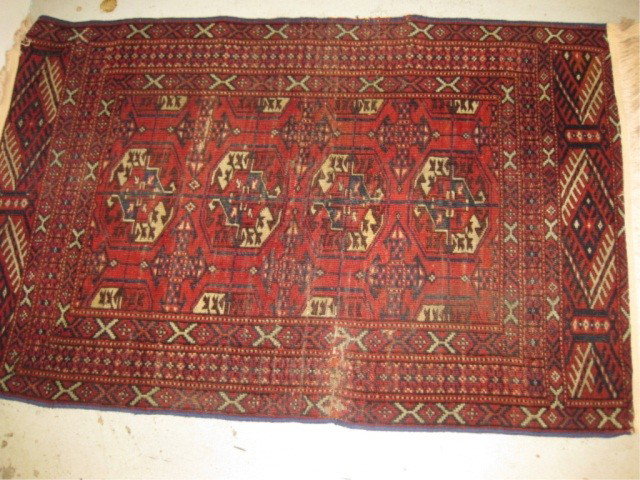 Bokara Throw Rug: 33 x 50 inches (shows wear)