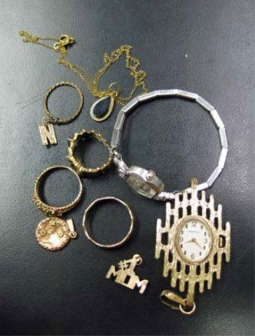 Assorted 14K Gold and Costume Jewelry: including Bulova gold filled watch, 2 14K gold rings and locket (as is), etc. 5 dwts.